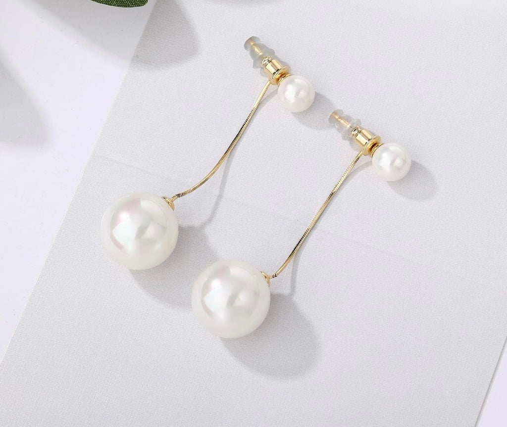 Darcy’s earrings single or several